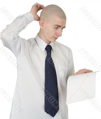 Perplexed guy with the financial graph in hands