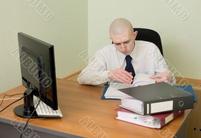 Bookkeeper on a workplace at office