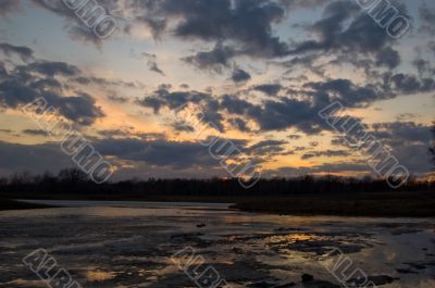 Suns last goodbye on a frozen lake