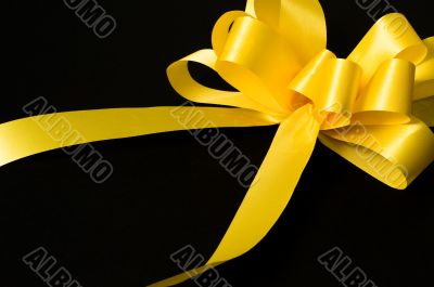 Yellow ribbon for a gift or support