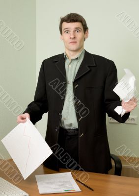 Director on a workplace with a crushed paper