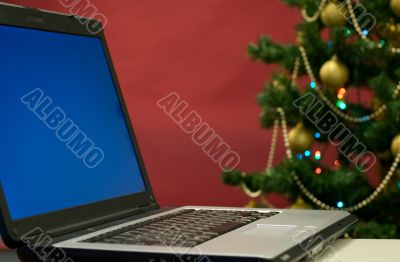 Laptop and christmas tree