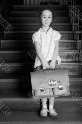 Little girl on the stairs