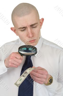 Man studying a counterfeit money