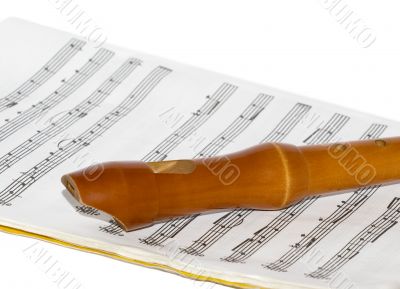 Recorder on a sheet music