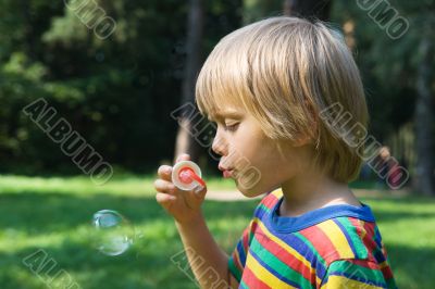 Boy with soap bubbles