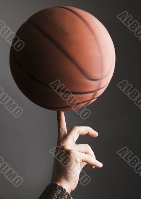 Basketball rolling on finger