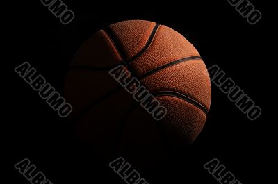 Basketball over black background