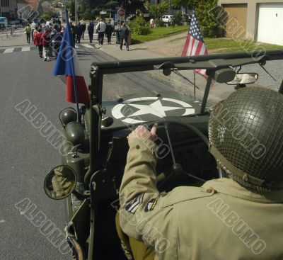 US GI driving an old jeep