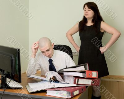 Bookkeeper and the secretary on a workplace