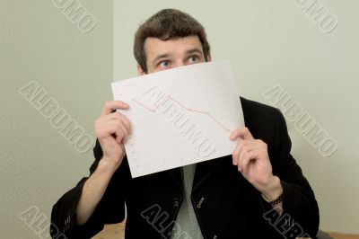 Director on a workplace with a graph