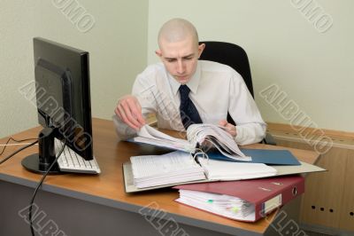 Bookkeeper on a workplace at office