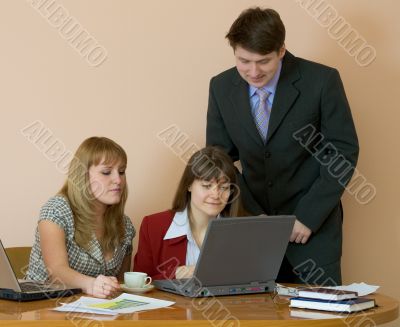 Girls at a desktop and their chief