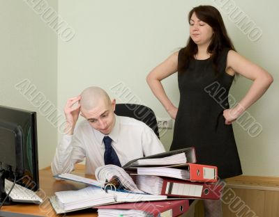 Bookkeeper and the secretary on a workplace