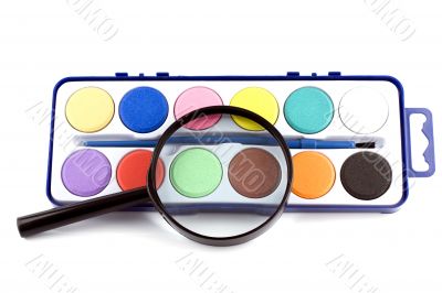 magnifying lens and paints
