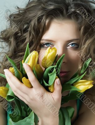 Portrait of woman with the bouquet.