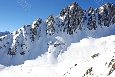 Mountain scenery with ski tracks