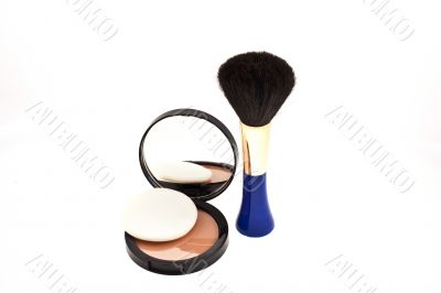 open face powder with mirror and a brush