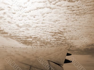 Aeroplane High in the Clouds sepia