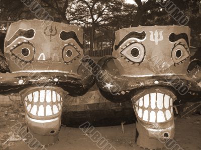 Colorful Ravana head effigies sepia