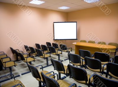 Interior of a conference hall in pink tones