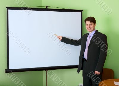 Businessman near the white screen
