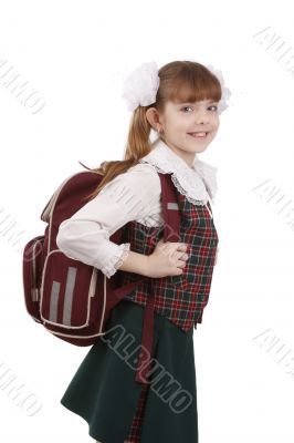 School girl with schoolbag. Education.