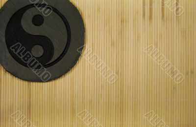 Ying Yang on grass mat