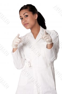 Portrait of a beautifull Indonesian nurse pointing