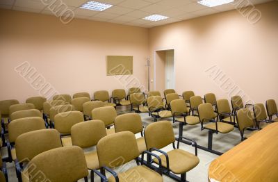 Interior of a conference hall in pink tones