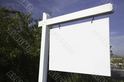 Blank Real Estate Sign in Neighborhood