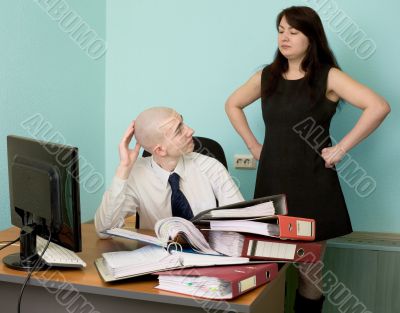 Bookkeeper and the secretary on a workplace