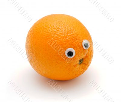 Funny orange fruit with eyes on white