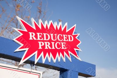 Red Reduced Price Burst Sign