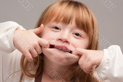 Portrait of an Adorable Red Haired Girl