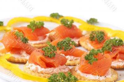 Smoked salmon and cream cheese on crackers