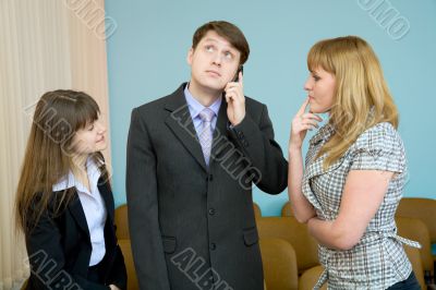 Man speaks by a mobile phone Man speaks by a mobile phone