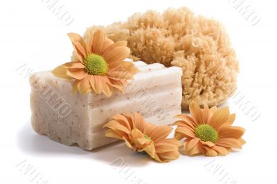 natural sponge, soap and flowers