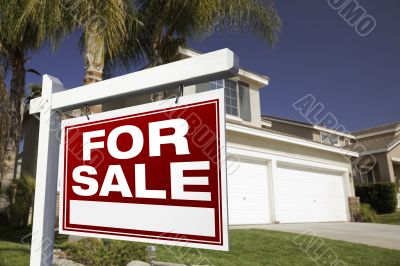 For Sale Real Estate Sign and House