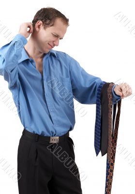 Businessman choosing a tie