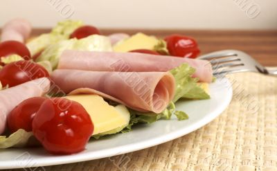 Fresh salad with cold meat, greens and peppers Fresh salad with cold meat, greens and peppers