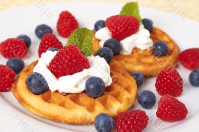 Belgian waffles with berries and cream Belgian waffles with berries and cream