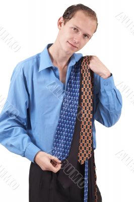 Businessman choosing a tie