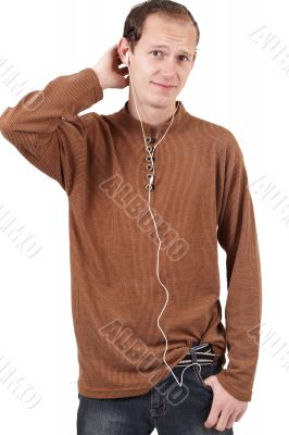 Young caucasian man listening to music