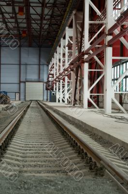 Railroad going into the distance on hangar