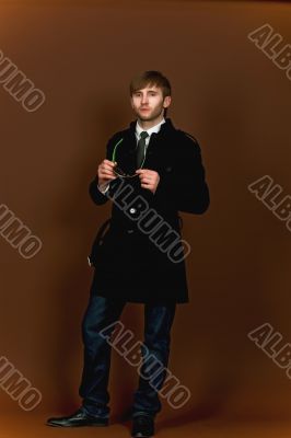 man in coat with sunglasses man in coat with sunglasses