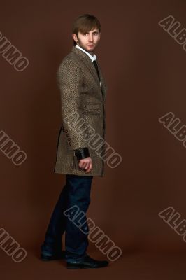 man in striped modern coat