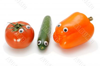 Funny tomato, cucumber and bellpepper with eyes