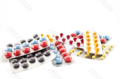 a number of multicolor pill blisters
