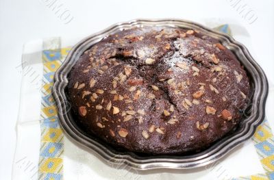 Chocolate cake on table-napkin